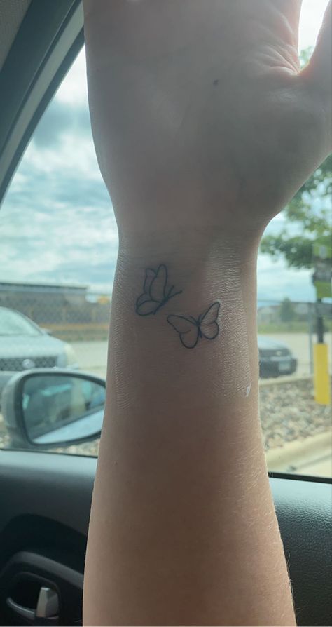 Tattoo Inspo For Mom, What Do Butterfly Tattoos Mean, Small Tattoos For First Time, Simple Mom Daughter Tattoos, Mum And Daughter Tattoo Butterfly, Hope Butterfly Tattoo, First Tattoo Ideas Butterfly, Small Butterfly Tattoo On Wrist Simple, Cute Butterfly Tattoos For Women