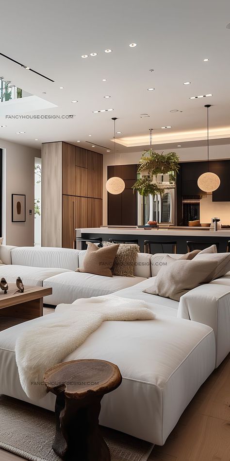 Neutral tones and warm hues create a welcoming atmosphere in the contemporary living room. Large Living Room Layout, Wall Art Decor Bedroom, Aesthetic Living Room, تصميم للمنزل العصري, Interior Design Guide, Design Room, Home Design Living Room, Furniture Finishes, Contemporary Interior Design