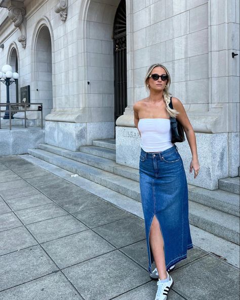 Denim maxi skirt spring outfit inspo European outfit inspiration styling denim maxi skirt Denim Maxi Skirt Summer, Maxi Skirt Denim Outfit, How To Style Maxi Denim Skirt, Denim Long Skirt Outfit Ideas, Jean Skirt Outfits Y2k, Bkk Outfit, Water Park Outfit, Maxi Jean Skirt Outfits, Midi Denim Skirt Outfit