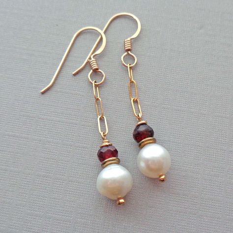 "* * * Elegant White Pearl & Garnet Drop Earrings * * * * Dress up any outfit with these beauties * Details: * 6mm White Akoya Pearl * 5x3mm Faceted Garnet Rondelles * Gold-Fill Paperclip chain links * Gold-Fill Ear wires * Measure 45mm (approx. 1.75\") from the top of the ear wire ~ Akoya Pearls are formed in the Ayoka oyster and they are the first pearls to be cultivated. In 1893, a Japanese man developed a scientific process for cultivating pearls and made pearls more affordable and widely di Silver Drop Earrings Simple, Simple Elegant Earrings, Wedding Pearls, Garnet Drop Earrings, Drop Earrings Simple, January Birthday, Jewelry Making Earrings, Sterling Silver Drop Earrings, Earrings Inspiration