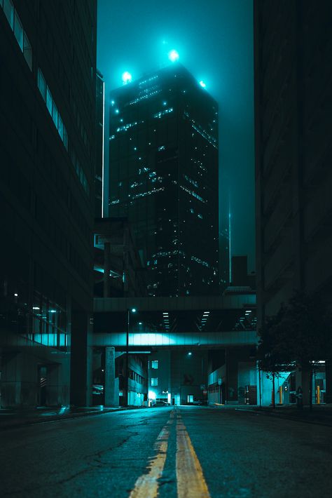 A low to the ground shot in the middle of a street in downtown Dallas. City At Night Background, Cityscape Night Photography, Dark City Photography, City In The Distance, Dark City Night Aesthetic, City At Night Photography, City At Night Art, Midnight Aesthetic City, Background Night City