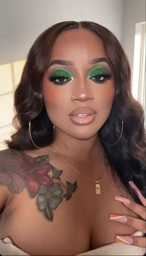 Green Wicked Eye Makeup, Prom Green Makeup Looks, Bright Makeup Looks Black Women, Green Glam Makeup For Black Women, Dark Green Makeup Looks Black Women, Green Prom Makeup Looks Black Women, Green Makeup Black Women, Green And Gold Makeup Looks Black Women, Green Eyeshadow Looks For Black Women