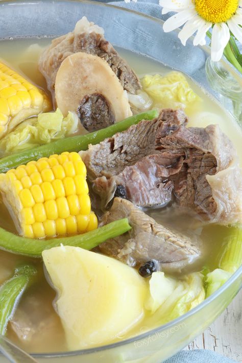 Nilagang Baka is a Filipino beef soup cooked until the meat is really tender and with vegetables like potatoes, beans and cabbage that makes this simple soup healthy and flavorful. | www.foxyfolksy.com Philippines Spaghetti, Beef Nilaga Recipe, Nilaga Recipe, Nilagang Baka, Ground Beef Soup, Best Cauliflower Recipe, Soup With Vegetables, Easy Filipino Recipes, Foxy Folksy