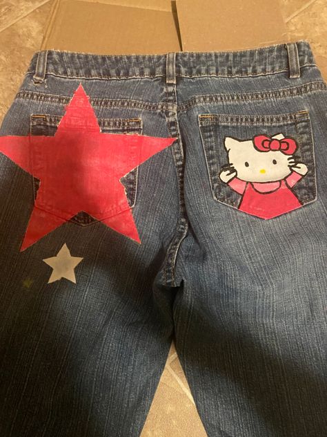 Painting On Pants Ideas, Homecoming Jeans Ideas, Hello Kitty Jeans, Diy Jeans Ideas, Custom Jeans Diy, Jeans Drawing, Hello Kitty Y2k, Y2k Hello Kitty, Diy Summer Clothes