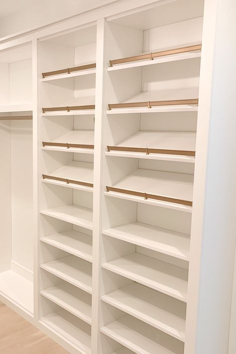 The only thing missing is the shoes! Your shoe rack plays an important role in your closet's organization, allowing you to neatly organize your shoes in any way that works for you. 📸: The Tailored Closet of Nashville Master Closet Shoe Shelves, U Shaped Shelves In Closet, Wardrobe Design Shoe Rack, Master Walk In Closet Shoe Storage, Walk In Closet Ideas With Shoe Rack, Build A Shoe Rack In Closet, Closet Shoe Display, Shoe And Accessory Closet, Built In Shoe Shelves Closet