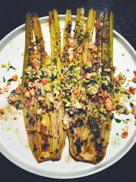 This Slow-Roasted Celery Will Be Your New Favorite Side Dish Thanksgiving Recipes Side Dishes Healthy, Side Dishes Veggies, Roasted Celery, Thanksgiving Recipes Side Dishes Veggies, Thanksgiving Vegetables Side Dishes, Thanksgiving Vegetable Sides, Recipes Side Dishes, Thanksgiving Vegetables, Celery Recipes