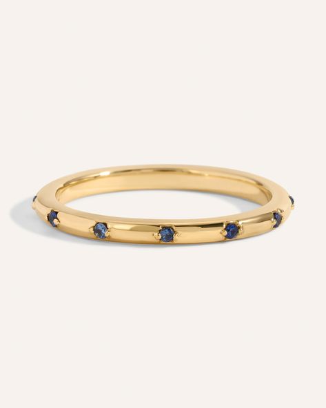 Sister to our Diamond Lucy Band. A fun twist on a traditional gold band with round sapphires spaced evenly all the way around. This .06ct eternity band is a great option for stacking or as wedding band. Band width, 1.7mm *Please note eternity bands cannot be resized. Gold Band With Sapphire, Wedding Band With Sapphire, Lucy Band, Sapphire Band Ring, Colored Wedding Bands, Blue Sapphire Wedding Band, Jewelry Alternative, Engagement Rings Unique, Blue Wedding Band