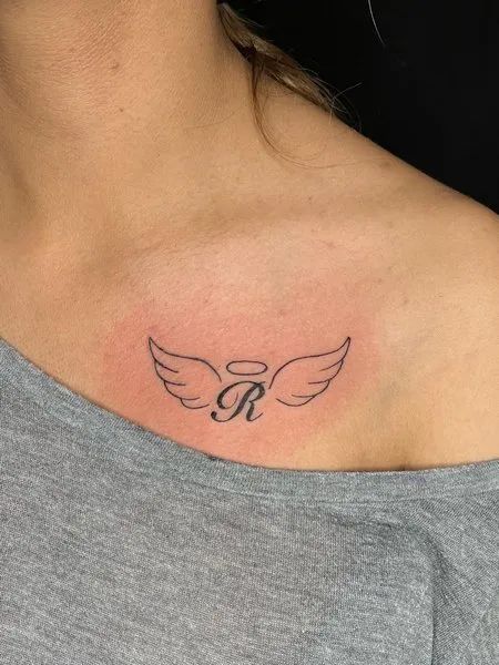 Angel Wings Chest Tattoo Initial Wings Tattoo, Small Angel Wings Tattoos, Loved One Passing Tattoo, Angel Tattoo Wrist, Mini Tattoos Angel Wings, Dad Tattoos For Daughter Small, Wing Tattoos For Women, Angel Wings Initial Tattoo, Tattoos For Lost Ones