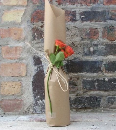 Wrap a bottle of wine in classy brown paper, twist the top and tie with a string, insterting a rose or another favorite flower. #wine #giftwrap #rose 9 Cute DIY Gift Wrap Ideas | All Gifts Considered Diy Gift Wrap Ideas, Wrap A Bottle, Wine Bottles Gift Wrap, Bottle Gift Wrapping, Wine Wrap, Gift Wrap Ideas, Wrapped Wine Bottles, Wine Bottle Gift Bag, Creative Tutorials