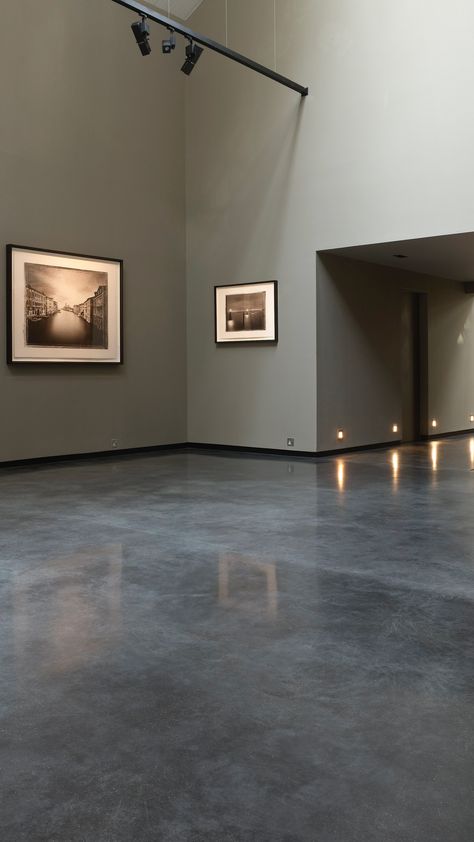 Lazenby’s installed 150m² Mayfair Grey polished concrete floor, with a lightly exposed aggregate, in this Mayfair Gallery. This architecturally neutral backdrop, for the professional photographic exhibitions, is thoughtful. Concrete Floors Living Room, Concrete Kitchen Floor, Stained Floors, Polished Cement, Cement Floors, Concrete Interiors, Concrete Flooring, Concrete Stained Floors, Cement Walls