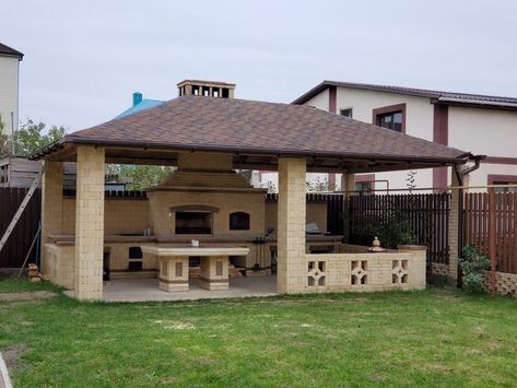 Design: Use sustainable materials like reclaimed wood or bamboo. Features: Integrate solar panels on the pergola roof to power outdoor lighting. Accents: Use eco-friendly furniture and decor, such as recycled plastic outdoor furniture and natural fiber rugs. #Tags #PergolaDesign #OutdoorLiving #BackyardTransformation #GardenPergola #ModernPergola #RusticPergola #MediterraneanStyle #OutdoorKitchen Outdoor Grill Diy, Rustic Outdoor Spaces, Outdoor Drapes, Patio Grande, Bbq Grill Design, Build Outdoor Kitchen, Outdoor Kitchen Plans, Outdoor Patio Space, Backyard Pavilion