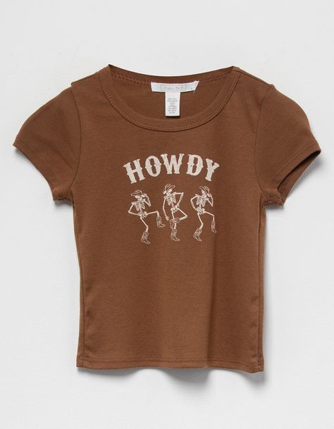 Full Tilt Western Skeleton Baby Tee. Graphic Screened At Center Chest. Ribbed Crew Neckline. Short Sleeve. 50% Cotton, 50% Polyester. Machine Wash. Imported. | Full Tilt Western Skeleton Girls Baby Tee Cute Baby Tees, Western Skeleton, Brown Graphic Tee, 7th Grade Outfits, Baby Tee Outfit, Skeleton Baby, Makerspace Ideas, Wishlist Christmas, Skeleton Girl