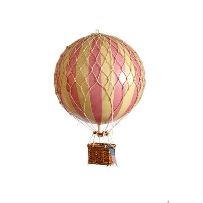 Balloons combine color, décor and science, all-in-one. They're as fascinating today as they were a century ago. Imagine viewing the earth from above, free as a bird, holding onto a balloon basket. Finish: Pink | Harriet Bee Canika Travels Light Plastic in Pink, Size 11.8 H x 7.1 W x 7.1 D in | Wayfair | Home Decor Hang From Ceiling, Balloon Basket, Balloon Modelling, Vintage Decorations, Small Balloons, Vintage Hot Air Balloon, Authentic Models, Large Balloons, Hanging Home Decor