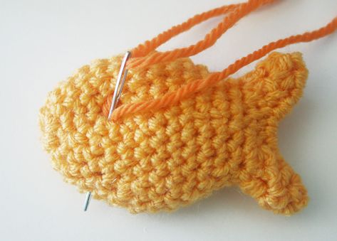 Free Crochet Pattern: Goldfish Cracker Pin! | Twinkie Chan Blog Crochet Goldfish Cracker Pillow Pattern Free, Crochet Goldfish Cracker, Goldfish Cracker Crochet Pattern, Crochet Goldfish Cracker Pattern Free, Crocheted Fish Patterns Free, Gold Fish Crochet Pattern Free, Goldfish Crochet Pattern Free, Goldfish Crochet, Crochet Goldfish