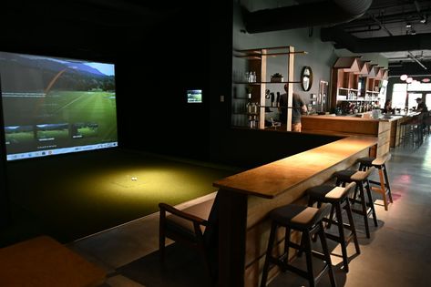 Golf Impact Screen, Sport Bar Design, Gears Turning, Simulator Room, Indoor Golf Simulator, Golf Bar, Home Golf Simulator, Impact Screen, Golf Simulator Room