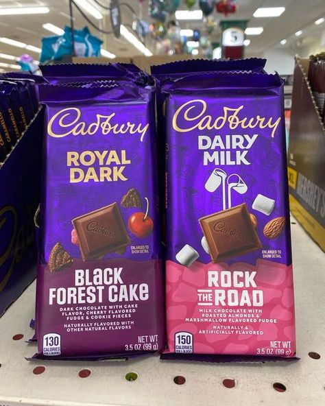 Snacking Life on Instagram: "Cadbury has two new chocolate bars! They have Black Forest Cake and Rock the Road. Black Forest Cake: Dark chocolate with cake flavor, cherry flavored fudge, and cookie pieces. Rock the Road: Milk chocolate with roasted almonds and marshmallow flavored fudge. Both sound good to me! Which one would you try? * * #chocolate #candy #marshmallows #darkchocolate #cookies @cadburyusa @hersheys @hersheycompany #summer #icecream" Flavored Fudge, Cake Dark Chocolate, Australian Snacks, Cadbury Chocolate Bars, Fountain Wedding Cakes, Cadbury Caramel, Chocolate Fantasy, Fudge Cookies, Dairy Milk Chocolate