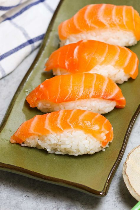 Salmon Nigiri (How to Make Salmon Sushi) Nigiri Recipe, Salmon Nigiri, Seafood Sushi, Salmon Sashimi, Nigiri Sushi, Salmon Sushi, Homemade Sushi, Easy Salmon, How To Make Sushi