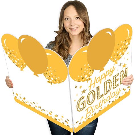 Golden Birthday Jumborific Card includes one giant greeting card made from cardboard plastic. Say a big birthday with an oversized card. LARGE GREETING CARD: With a balloon shaped top, the front of the card reads "Happy Golden Birthday." Open the card and stack the "Stay Golden" message for even more dimension. The inside left side is blank, giving you space to handwrite a personal message. BIRTHDAY CARD: Surprise a friend or loved one when you give them a Jumborific Card. The thick, sturdy plastic allows this card to stand up for a unique display and serve as a memorable keepsake. Perfect for sending birthday wishes. HIGH QUALITY CARD: Golden Birthday Jumborific Card measures 16.5" wide (folded) x 22" tall. This giant greeting card is professionally printed on durable corrugated plastic w Happy Golden Birthday, Giant Card, Glitter Images, Golden Birthday, Stay Golden, Balloon Shapes, Unique Display, Miniature Gift, Big Dot Of Happiness