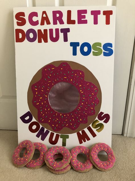 Donut toss game with donut bean bags. Donut Party Decorations, Donut Theme Party, Doughnut Party, Donut Themed Birthday Party, Grown Up Parties, Birthday Donuts, Donut Birthday Parties, First Birthday Party Themes, Toss Game