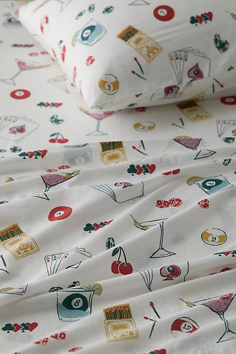 Keep calm and go to Vegas, or in this case, bed. Refresh your bedding with these soft cotton bed sheets with casino-inspired icons printed allover. Each bed sheet set includes a flat sheet, fitted sheet and pillowcases. Available exclusively at Urban Outfitters. Features Vegas Baby Core Sheet Set from UO Home in a soft, lightweight cotton fabrication Finished with casino-inspired icons allover Includes all you need to make your bed: a flat sheet, fitted sheet and pillowcases An eco-friendly upgrade, this item is OEKO-TEX® Standard 100 certified free of harsh chemicals UO exclusive Content + Care Pillow inserts sold separately Twin XL sheet set includes pillowcase, flat sheet and fitted sheet Full, Queen and King sheet sets include 2 pillowcases, flat sheet and fitted sheet 100% Cotton OEKO Eclectic Bed Sheets, Cool Sheets Bedding, Urban Outfitters Sheets, Cherry Bedding, Miami Bedroom, Cute Sheets, Fun Sheets, Polka Dot Bedding, Cotton Bed Sheets