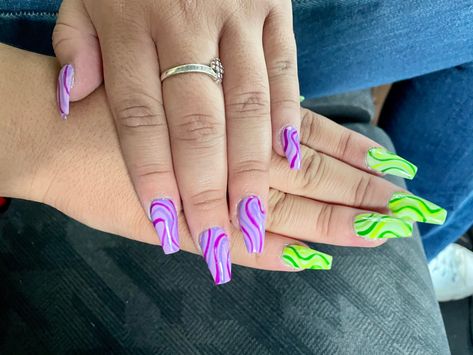 Neon Green And Purple Nails Design, Green Purple And White Nails, Blue Purple And Green Nails, Purple Rave Nails, Neon Purple Nail Designs, Neon Purple And Green Nails, Green And Purple Acrylic Nails, Purple Green Nails Designs, Light Purple And Green Nails