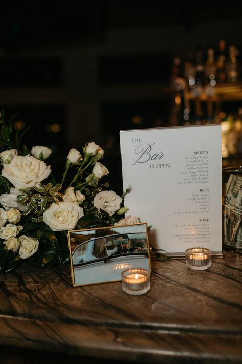 Photo by Valerie Lendvay. Wedding Favor Table Display, Wedding Welcome Table Ideas, Wedding Guest Book Table Decorations, Welcome Table Wedding, Wedding Card Table, Guest Book Table Decor, Wedding Ushers, Burgundy Wedding Centerpieces, Wedding Welcome Table