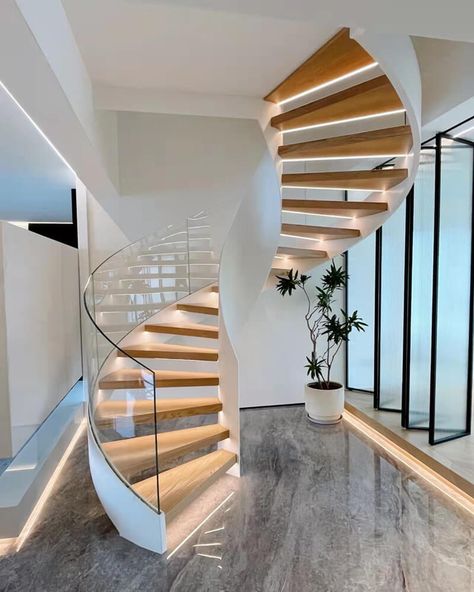 Penthouse Helical Staircase with Frameless Glass Railing and Led lighting (5) Glass Staircase Railing, Round Stairs, Spiral Stairs Design, Modern Stair Railing, Staircase Design Modern, Stairs Design Interior, Glass Stairs, Escalier Design, Stair Railing Design