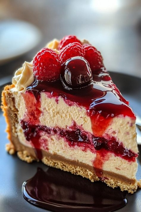 Decadent Peanut Butter & Jelly Cheesecake Recipe! 🍰 Peanut Butter Jelly No Bake Cheesecake, Jelly Cheesecake Recipes, Peanut Butter Jelly Desserts, Peanut Butter Jelly Pie, Pb&j Cheesecake, Peanut Butter Jelly Cheesecake, Peanut Butter And Jelly Recipes, Juniors Cheesecake Recipe, Pbj Cheesecake