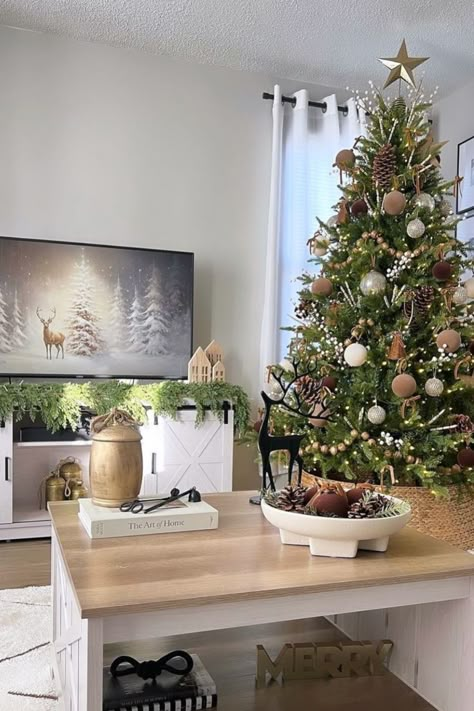 28 Neutral Christmas Tree Ideas For Cozy Holiday Decor - The Chic Quota Neutral Cozy Christmas Decor, Neutral Christmas Coffee Table Decor, Neutral Christmas Tree Decor Ideas, Clean Christmas Tree, Christmas Entertainment Center Decor, Woodland Theme Christmas Tree, Neutral Christmas Tree Ideas, Modern Organic Christmas, Pencil Trees Decorating Ideas