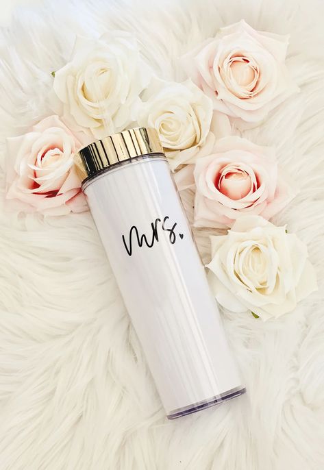 Mrs. tall tumblers are the perfect gift for the new brides to be! Each acrylic water bottle comes with a metallic gold lid and is personalized with mrs. Bride Water Bottle, Bride Sunglasses, Tumbler Care Instructions, Cricut Wedding, Water Wedding, Personalized Coffee Mugs, Wedding Gifts For Couples, Ideal Wedding, Bridal Shower Favors