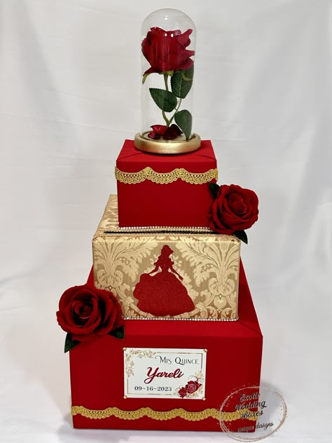 Introducing our exquisite Beauty and the Beast Card Box, an exceptional addition to any Quinceanera, Sweet 16, Bat Mitzvah, or Birthday Party celebration. Designed to capture the enchanting essence of the famous fairytale, this card box is an absolute showstopper. Crafted with meticulous attention to detail, the box features a stunning red and gold color scheme, reminiscent of a royal palace. The image showcases a trio of decadent cakes, elegantly stacked and adorned with enchanting roses on top Card Box For Quinceanera, Beauty And The Beast Quince, Beauty And Beast Birthday, Beauty And Beast Wedding, Quince Decorations, Pink Wedding Cake, Enchanted Rose, Gold Color Scheme, Decadent Cakes