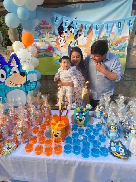 1st Bluey Birthday Party, Bluey Party Centerpieces Diy, Bluey And Bingo Party Decor, Bluey Party Decorations Table, Bluey Candy Table, Bluey Themed Birthday Party Food Ideas, Bluey Party Theme, Bluey Dessert Table, Bluey Party Favor Ideas