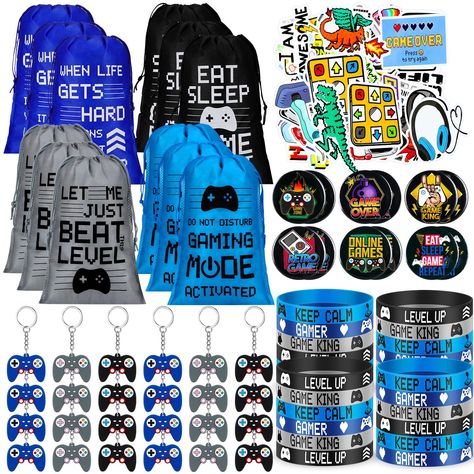 PRICES MAY VARY. Rich Combinations: the package contains 122 pieces of gamer party favors, including 12 pieces of gift bags, 24 pieces of game party silicone bracelets, 24 pieces of gaming keychains, 12 pin badges and 50 video game stickers to meet different preferences and decoration needs, enough to share with your friends or family Portable Sizes: the gamer bracelets wristbands are approximately 2.56 inches in diameter and 0.5 inches in width, stretchable to fit most people for a comfortable Drawstring Bracelets, Gaming Stickers, Video Game Party Favors, Video Game Party Decorations, Video Games Birthday Party, Gamer Birthday, Mode Retro, Video Game Party, Video Games Birthday