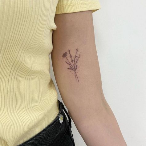 Fine line flower bouquet tattoo on the inner arm Inner Arm Line Tattoos For Women, Fine Line Tattoo Bicep, Flowers Inner Arm Tattoo, Flower Tattoo On Inner Arm, Arm Bouquet Tattoo, Inside Of Upper Arm Tattoo Women, Bicep Bouquet Tattoo, Flower Bouquet Tattoo Bicep, Inner Arm Tattoo Flower