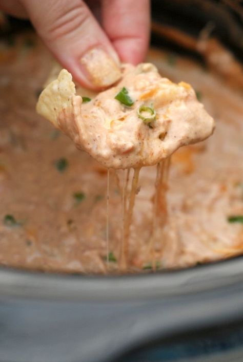 This recipe for the World's Best Easy Cheesy Bean Dip is cooked in your crock pot and made with three kinds of cheese, green chilies, and Mexican spices.  Everyone will want the recipe! Crock Pot Vegetarian, Cheesy Bean Dip, Cheese Dip Crock Pot, Refried Bean Dip, Bean Dip Recipes, Crock Pot Dips, Mexican Appetizers, Vegetarian Crockpot, Food Appetizers