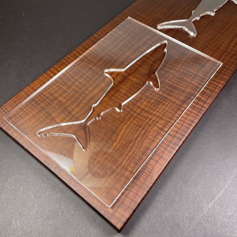 "These laser cut acrylic Templates are perfect for creating unique inlays in signs, charcuterie boards and more! These templates are offered in 1/4\" Thickness, which is perfect for using as a flush trim router bit. We use a 3/16\" Flush Trim Router bit. The Shark profile is approximately 10.875\" long by 3.625\" tall They are reusable and are great for smaller shops! A clear template allows for the perfect placement so you can include specific details in your board. The Template is 11.75\" wide Router Templates, Flush Trim Router Bit, Acrylic Templates, Wood Table Legs, Trim Router, Router Bit, The Shark, Laser Cut Acrylic, Marking Tools