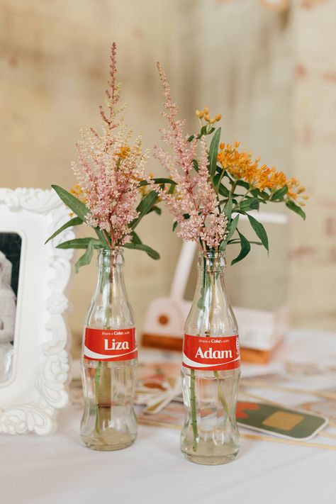 Name Coke Bottle Flower Floral Personalised Left Bank Leeds Wedding Amber Marie Photography #Name #Coke #Bottle #WeddingFlowers #Floral #Personalised #Wedding Coke Bottle Decorations Ideas, Crafts With Coke Bottles, Coke Bottle Centerpiece, Flowers In Coke Bottles, Coke Bottle Flowers, Coke Bottle Decor, Flower In Bottle, Coca Cola Wedding, Coke Bottle Crafts