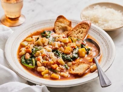 Winter Minestrone and Garlic Bruschetta Recipe | Ina Garten | Food Network Garlic Bruschetta, Winter Minestrone, Soup And Bread, Pesto Spinach, Ina Garten Recipes, Bruschetta Recipe, Small Pasta, Minestrone Soup, Soup And Stew