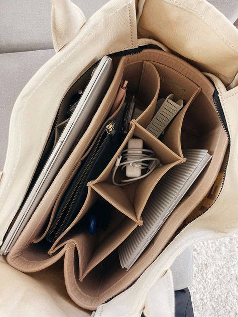 if you have a tote bag you NEED this tote organizer !! Comes in so many different sizes & is so nice to keep everything organized!! #organizing #totebag #salealert Follow my shop @maddyytrueman on the @shop.LTK app to shop this post and get my exclusive app-only content! #liketkit #LTKitbag #LTKU #LTKunder50 @shop.ltk https://liketk.it/3Qz8G Organized Bags And Purses, School Bag Organizer, Everything Tote Bag, Make Up Bag Organizer, University School Bag, Bags That Go With Everything, Office Bag Organization, Bag In Bag Organizing, Whats In My Marc Jacobs Tote Bag