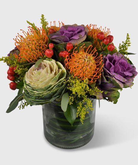 Unique Bouquet, Unique Arrangement, Kale Arrangement, Kale, Protea, Pincushion Protea, Fall Arrangement, Fall Flowers, Fall Bouquet, Autumn Arrangement, Autumn Flowers, Autumn Bouquet, Hypericum, Berries, Ornamental Kale, Thanksgiving Flowers, Thanksgiving Arrangement, Thanksgiving Bouquet, Thanksgiving, Fall, Harvest Blooming with unique style, this striking, seasonal bouquet is sure to send warm wishes to any loved one and delight them in the unexpected.  We combine bold pincushion protea and ornamental purple kale accented with lush greens and berries to provide a rounded and full look. Designed in a clear glass cylinder vase, this fresh floral arrangement will be an unforgettable gift for any autumn occasion.  Perfect as a fall gift or unique Thanksgiving Centerpiece. Fall Flower Arrangements For Home, Fall Floral Arrangements Centerpiece, Fall Vase Arrangements, Thanksgiving Arrangements, Centerpiece Unique, Autumn Arrangements, Thanksgiving Floral Arrangements, Purple Kale, Pincushion Protea