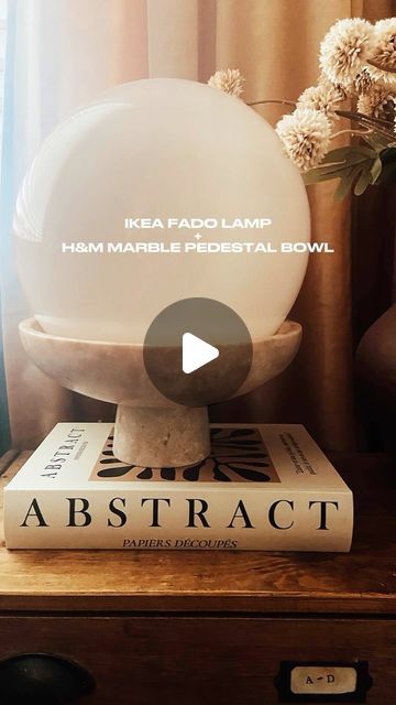 Pati-DIY & Home 🇬🇧🇵🇱 on Instagram: "(PL↴)🇬🇧When @ikea and @hmhome are the Beyoncé and Jay-Z of budget decor!
Presenting the Power Couple of the Century: the IKEA FADO Lamp and H&M’s Marble Pedestal Bowl—a match made in the aisles of minimalist heaven. One’s a spherical symbol of soft mood lighting, and the other is, well, a bowl that’s probably never held fruit because it’s too busy holding a glow-up. You know it’s true love when your lamp doesn’t sit on the pedestal; it’s elevated by it. And now, they’ve teamed up to give the phrase “outshine the competition” a literal meaning.

Forget star-crossed lovers—this is sphere-on-pedestal greatness! All for a combined price that might still let you afford the occasional avocado toast.

🇵🇱Gdy IKEA i H&M Home stają się Beyoncé i Jay-Z budż Ikea Fado Lamp, Fado Lamp, Ikea Fado, Marble Pedestal, Ikea Lamp, Budget Decor, Star Crossed Lovers, Pedestal Bowl, Beyonce And Jay Z