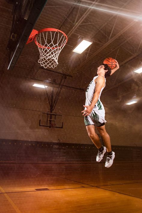 Senior high school basketball photography. Player is dunking a basketball in the school gym. Senior Basketball Photography, Golf Senior Pictures, Senior Sports Photography, Basketball Pictures Poses, Workout Photoshoot, Basketball Senior Pictures, Cute Senior Pictures, Creative Senior Pictures, Senior Photos Boys