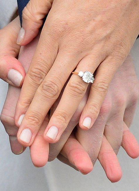 Meghan Markle's engagement ring got a chic upgrade—see the before and after photos. Megan Markle Engagement Ring, Meghan Markle Engagement Ring, Meghan Markle Engagement, Royal Engagement Rings, Expensive Engagement Rings, Ring Upgrade, Cheap Diamond Rings, Engagement Celebration, 3 Stone Engagement Rings