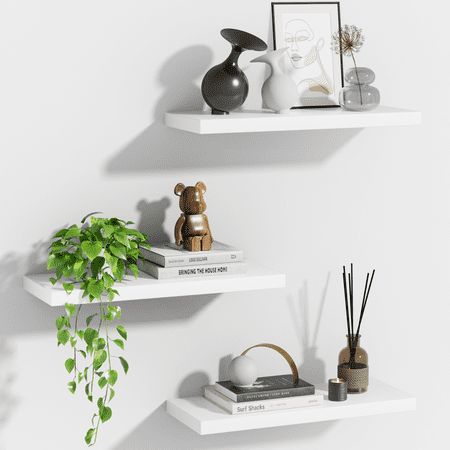 Set of 3 Modern Style Floating Shelves Wall Mounted for Decor, White These floating Shelves add a classic touch to bedrooms, living rooms, kitchens, and home offices. The invisible shelves floating shelves can help make full use of your empty walls, which is much more space-saving. They can not only organize daily sundries to make your space tidy and neat, they can also display your art pieces on the wall to decorate your home and make it full of aesthetic flare. Size: 15inchL x 6.7inchW x 1.4in Style Floating Shelves, Shelf Above Bed, Easy Shelves, Floating Shelves Bedroom, Wall Storage Shelves, Wall Shelves Bedroom, Shelf Decor Bedroom, Floating Shelves Living Room, Floating Shelf Decor