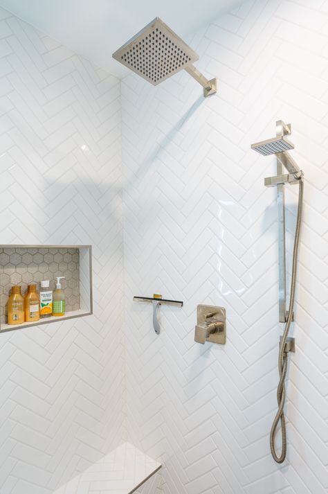 Small Bathroom Two Shower Heads, Herringbone Shower Tub Combo, Herringbone Shower Tile With Niche, White Herringbone Tile Shower Wall, Herringbone Shower Accent Wall, Bathroom Shower Tile Ideas Walk In Herringbone Pattern, Herringbone Tile Bathroom Shower Wall, Large Herringbone Shower Tile, White Herringbone Tile Bathroom Wall