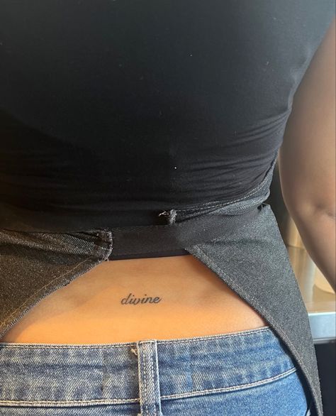 Cute Tramp Stamps Lower Backs, Lower Back Small Tattoos For Women, Dainty Tramp Stamp Words, Small Dainty Tramp Stamp, Divine Lower Back Tattoo, Back Tattoos Elegant, Cute Simple Tramp Stamps, Name Back Tattoo For Women, Divine Tramp Stamp