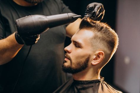 Handsome man at a barber shop styling ha... | Free Photo #Freepik #freephoto #business #people #beauty #face Barba Grande, Mens Barbershop, Haircut Salon, Barber Man, Handsome Bearded Men, Shaving Beard, Face Shape Hairstyles, Styling Hair, Corte De Cabelo Masculino