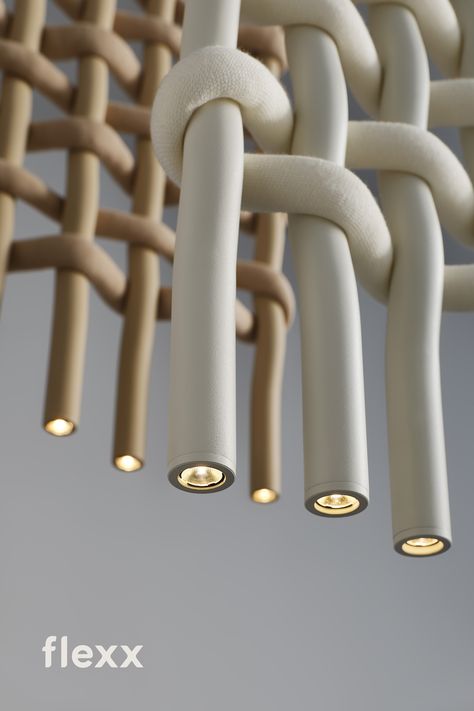 The lamp resembles fabric in texture but it has been enlarged to a giant scale. The “warp” is made of folded aluminum tubes and the “weft” is made of thick wool fortified with foam. This overscaled lighting design has been specially chosen to allow for the division of optical and acoustic space. At the same time, it does not close the space completely, because it is openwork. When dimmed, it can be used to provide mood lighting in spaces for relaxing. Lighting Design Interior, Lampe Design, Lighting Inspiration, Interior Projects, Ceiling Design, Decoration Design, Interior Design Projects, 인테리어 디자인, Light Art