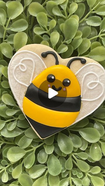 Brandi Garcia on Instagram: "Happy Flippin’ Friday! It’s the day of the week when I share a cookie cutter “flip” by decorating a cookie as something other than the cutter was intended.

This week, a heart into a bee ❤️➡️🐝 I hope your weekend is sweet as can be!

#cookies #flipthatcutter #cookiedecorating #sanantoniocookier #flippinfriday" Firefly Cookies Decorated, Bee Sugar Cookies Decorated, Bumble Bee Cookies Decorated, Bee Cookies Royal Icing, Bees Cookies, Bee Biscuits, Bee Cookies Decorated, Summer Cookies Decorated, Bumble Bee Cookies