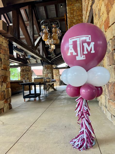 College Balloons, Balloon Centerpiece Ideas, Senior Tables, Aggie Graduation Party, Nike Party, Ring Dunk, Seniors 2024, Graduation Party Pictures, Balloon Tassel